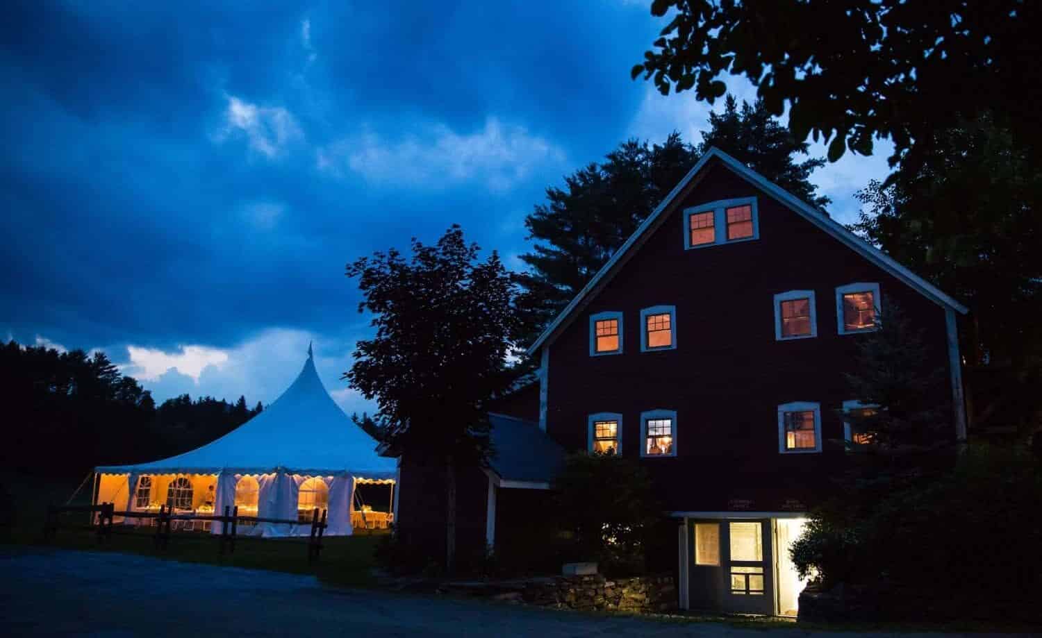 1824 House Inn + Barn - Nighttime Exterior with Event Tent