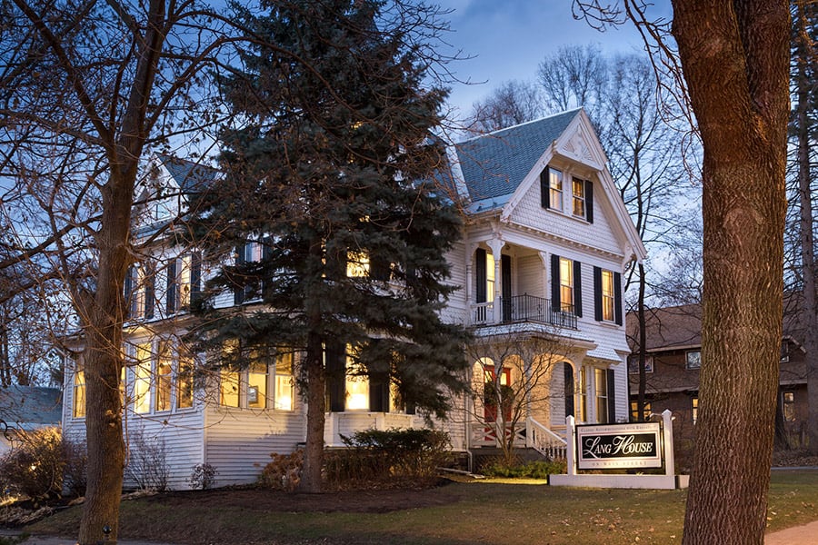 Lang House on Main Street - Fall Exterior Entrance with Sign