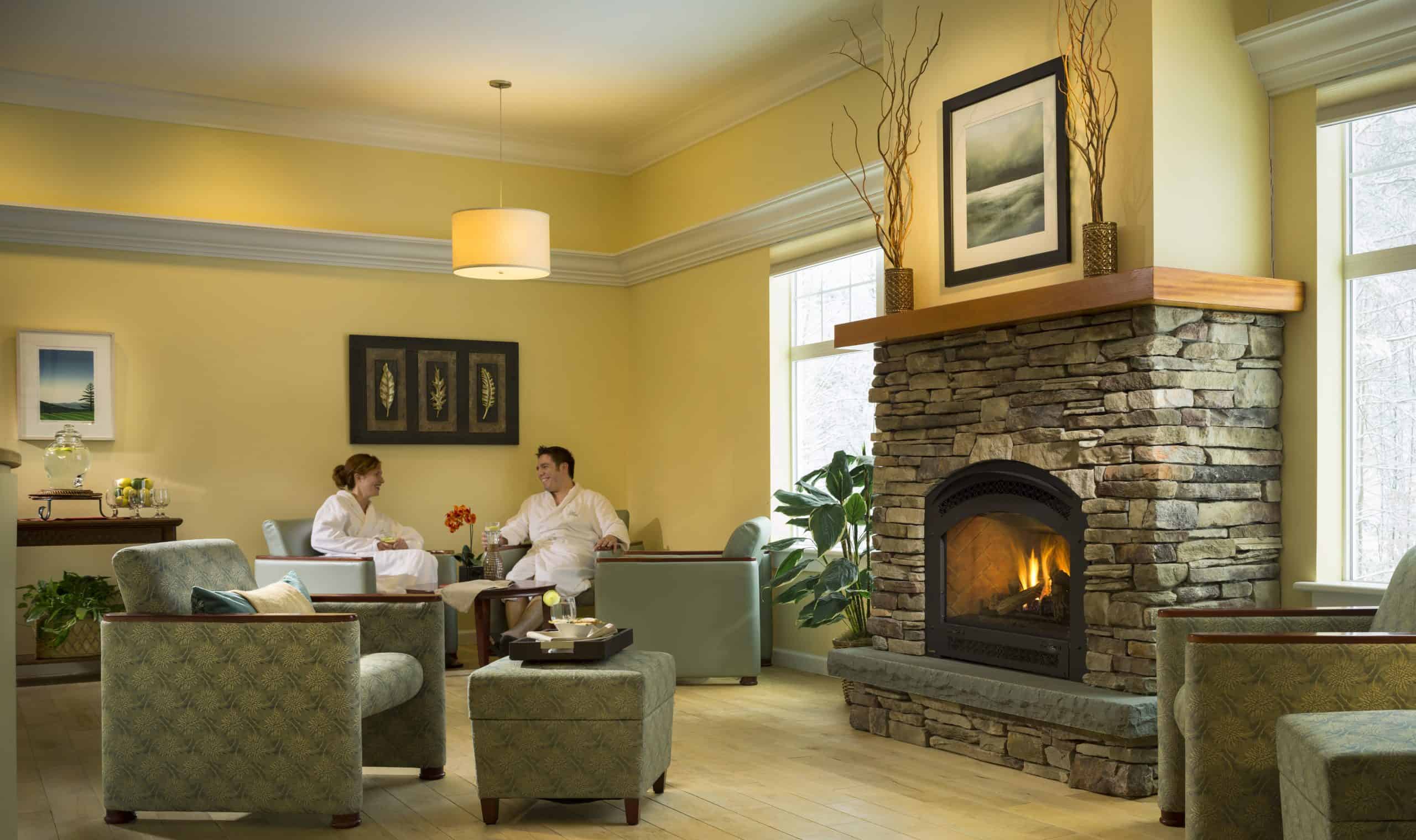 The Essex - Spa Lounge with People and Fireplace