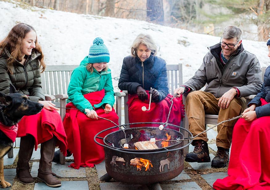 506 On The River Inn - Winter Fire Pit with Guests Roasting Marshmallows