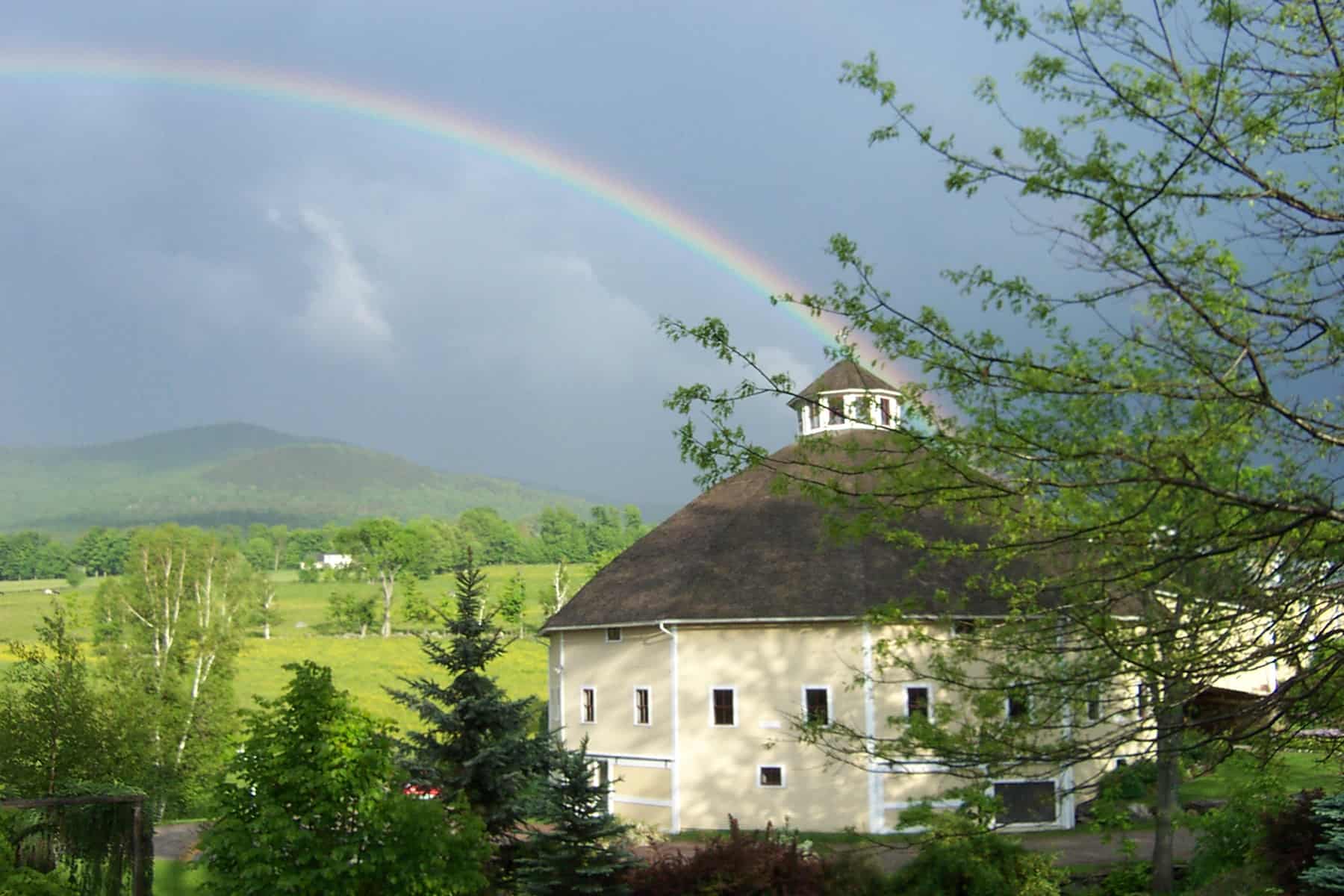 Inn at the Round Barn Farm - Summer with Rainbow over Barn