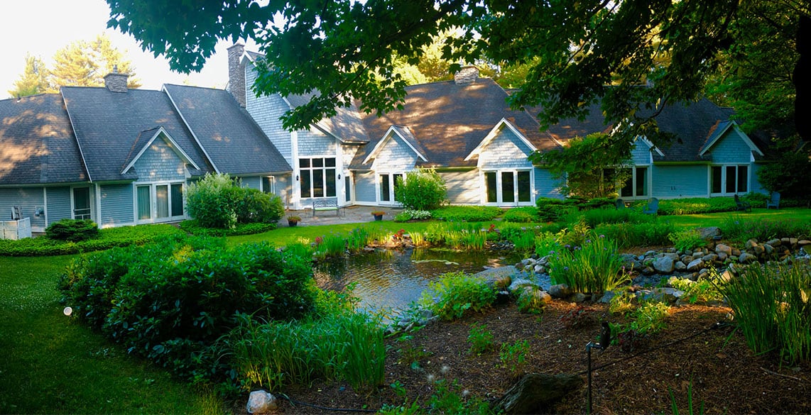 Stone Hill Inn - Summer Exterior with Pond