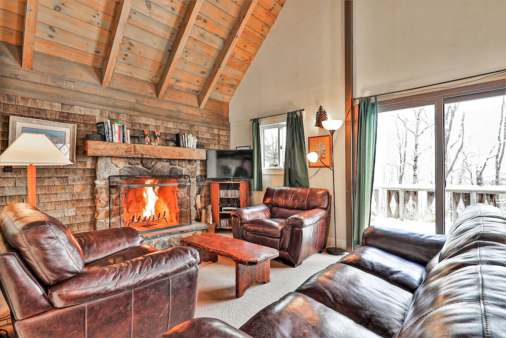 Classic ski home with hot tub, washer:dryer, mountain views Living Room Fireplace