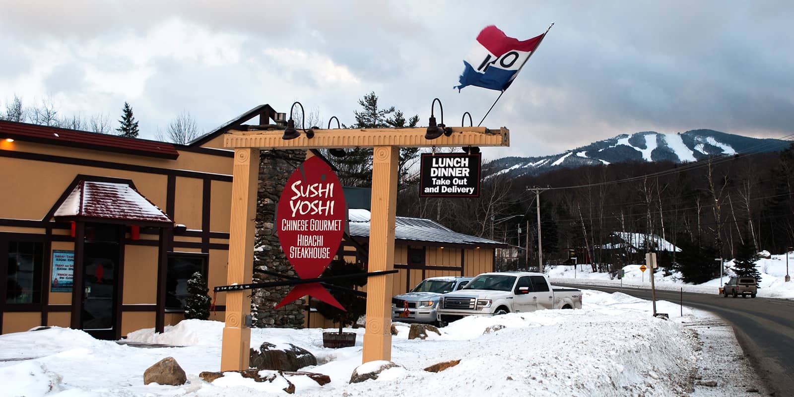 Sushi Yoshi Killington - Winter Exterior with Sign and Mountain