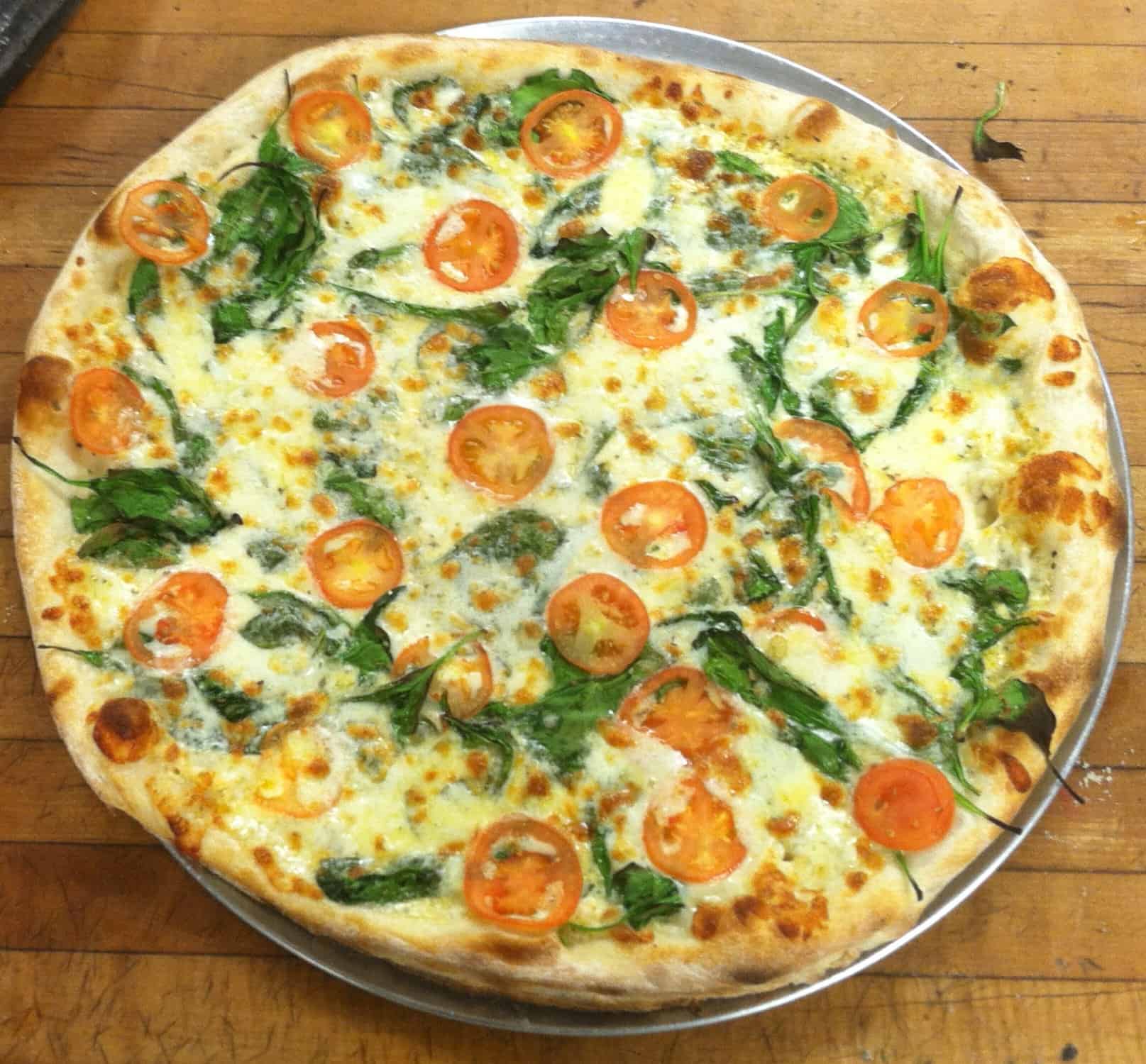 Ramuntos Brick Oven Pizza - Brattleboro - Spinach Tomato Pizza