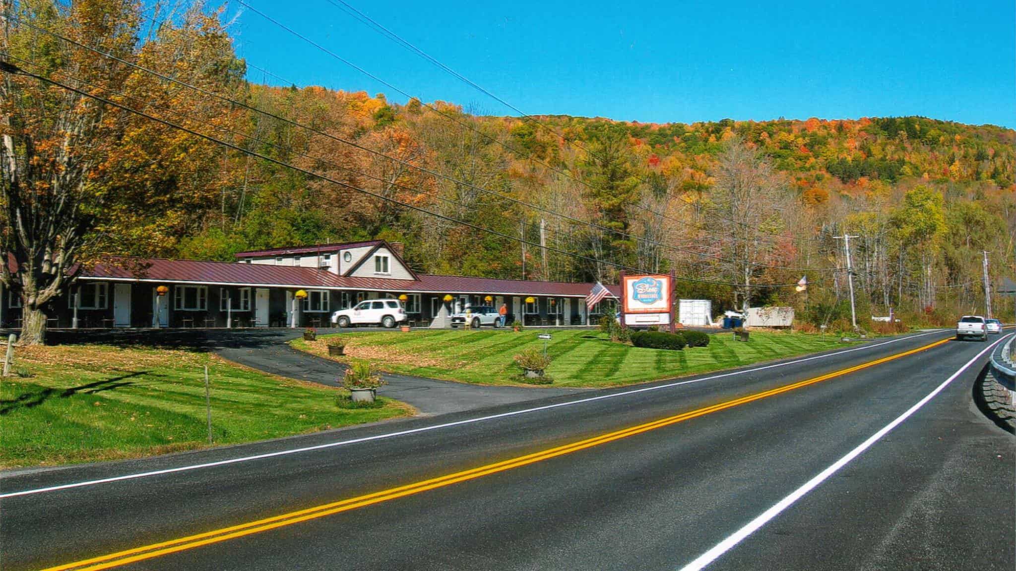 Sleep Woodstock Motel Fall Foliage from Road