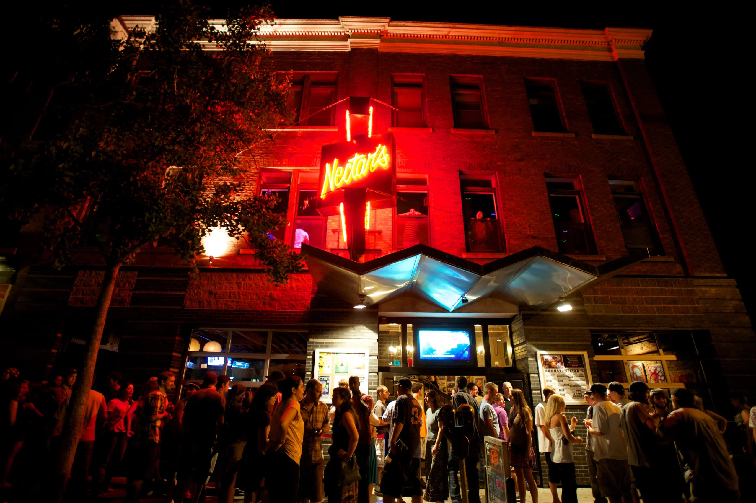 Nectar's - Outside Crowd at Night with Neon Sign