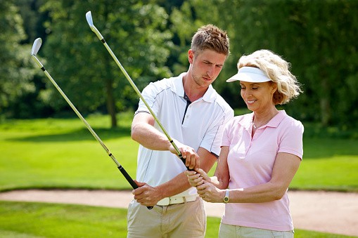 Green Mountain National Golf Course - Instructor with Student