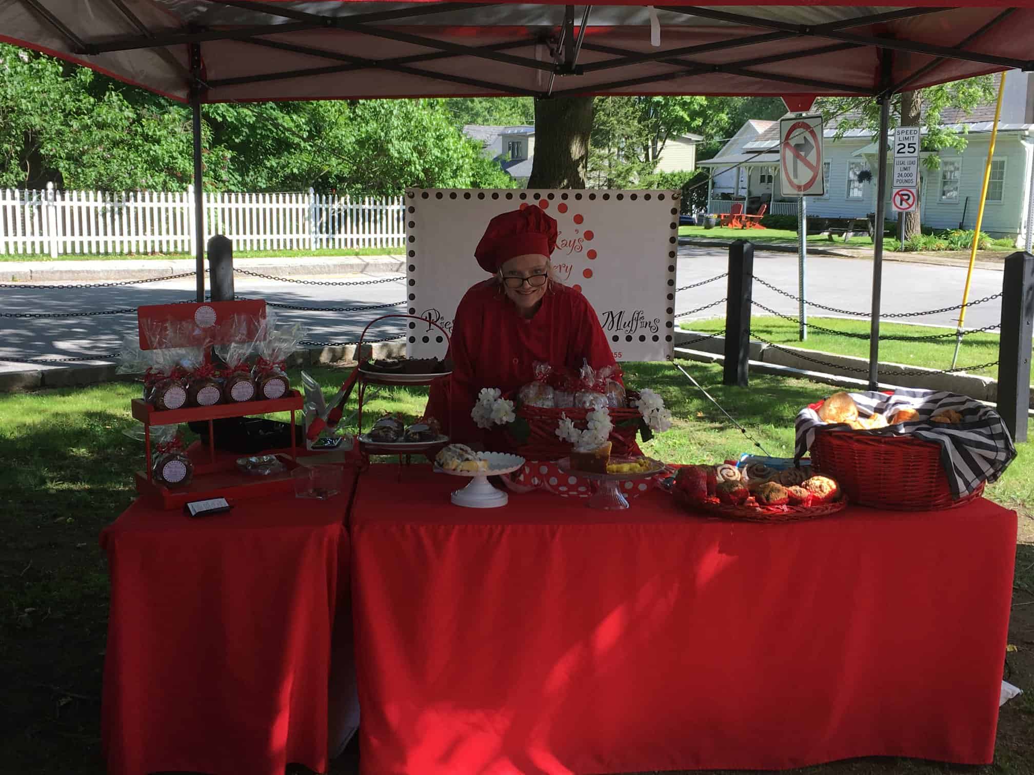 Manchester Farmers Market Bakery Vendor with Red Chef Hat
