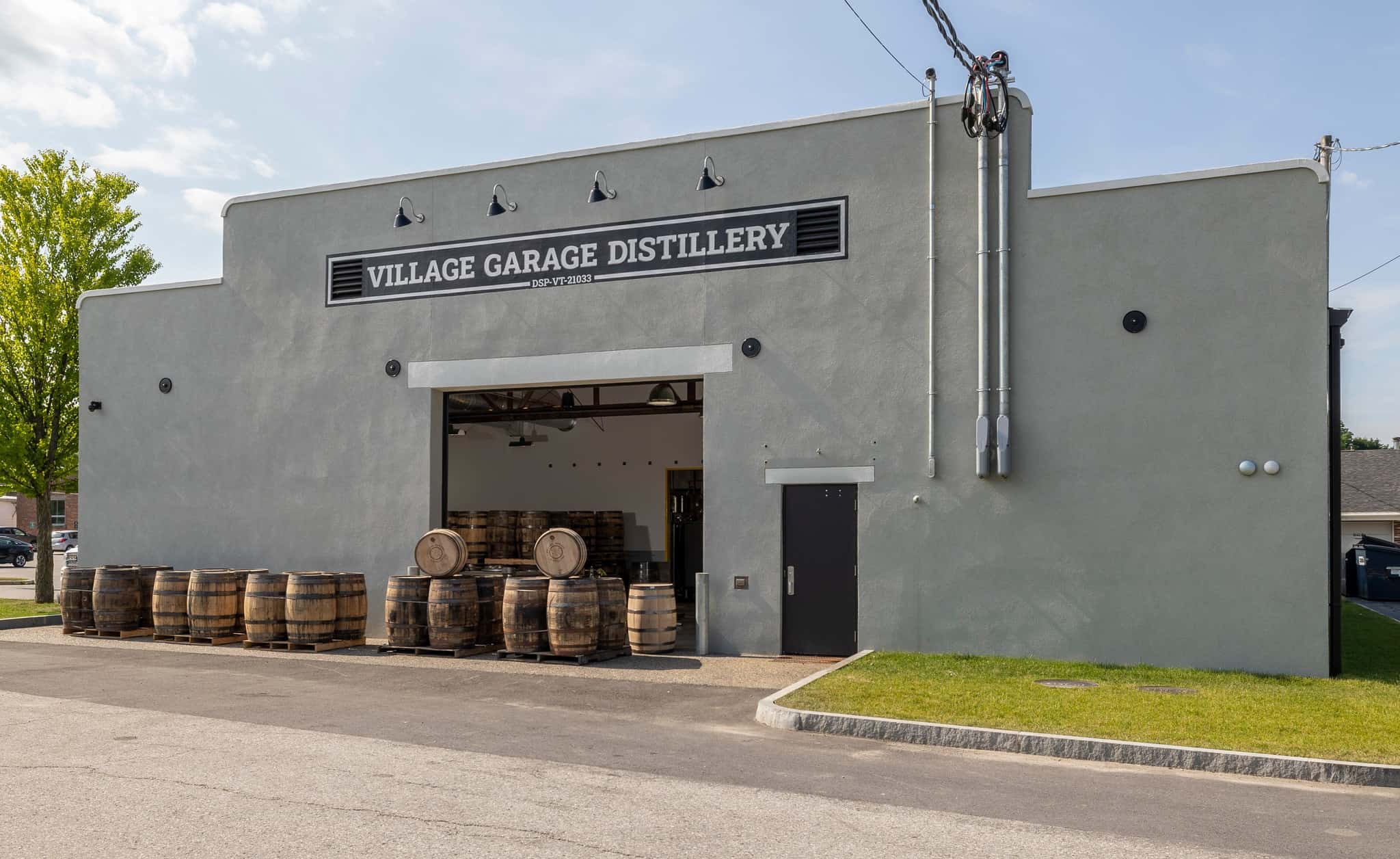 Village Garage Distillery Exterior Casks in Daylight