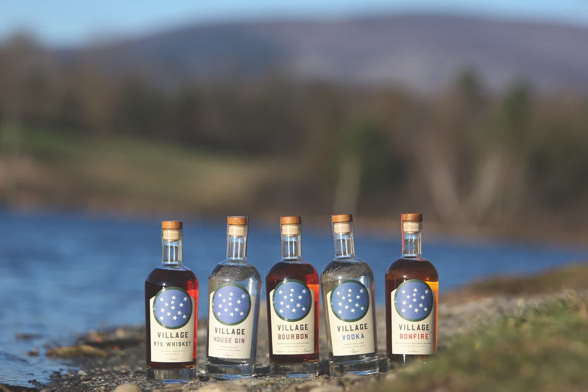 Village Garage Distillery Product Lineup on Shores of Lake