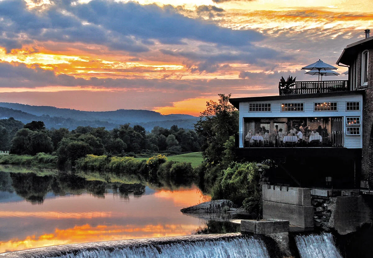 Simon Pearce - Summer Building Exterior Overlooking the River